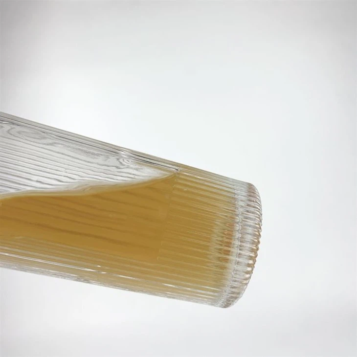 High Transparent 700ml Non-slip Design Easy To Hold Glass Bottles With Vertical Stripes